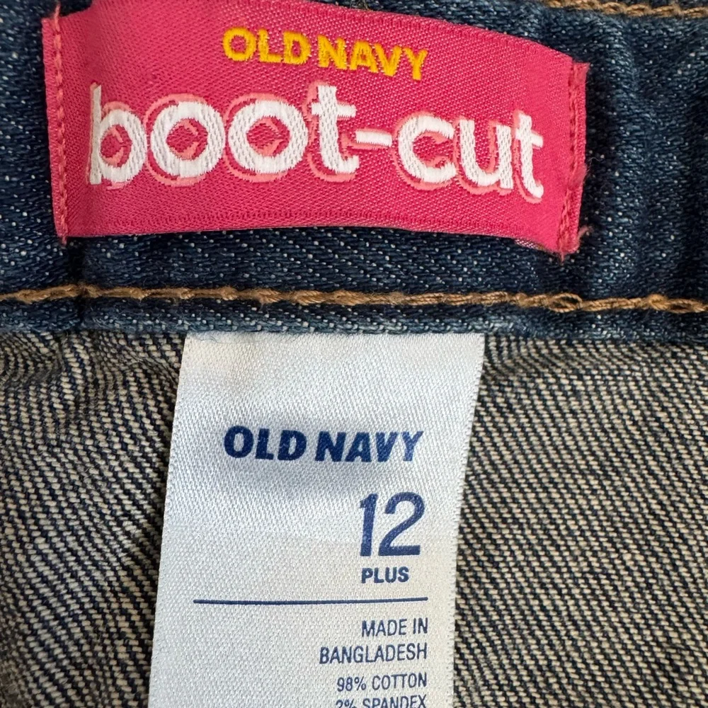 Old Navy bootcut blue jeans.  Girls size 12 plus
